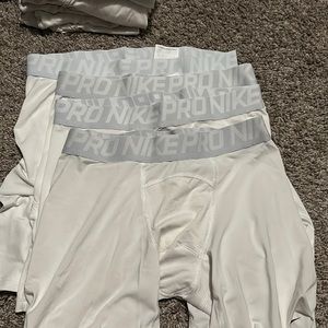 white Nike compression shorts